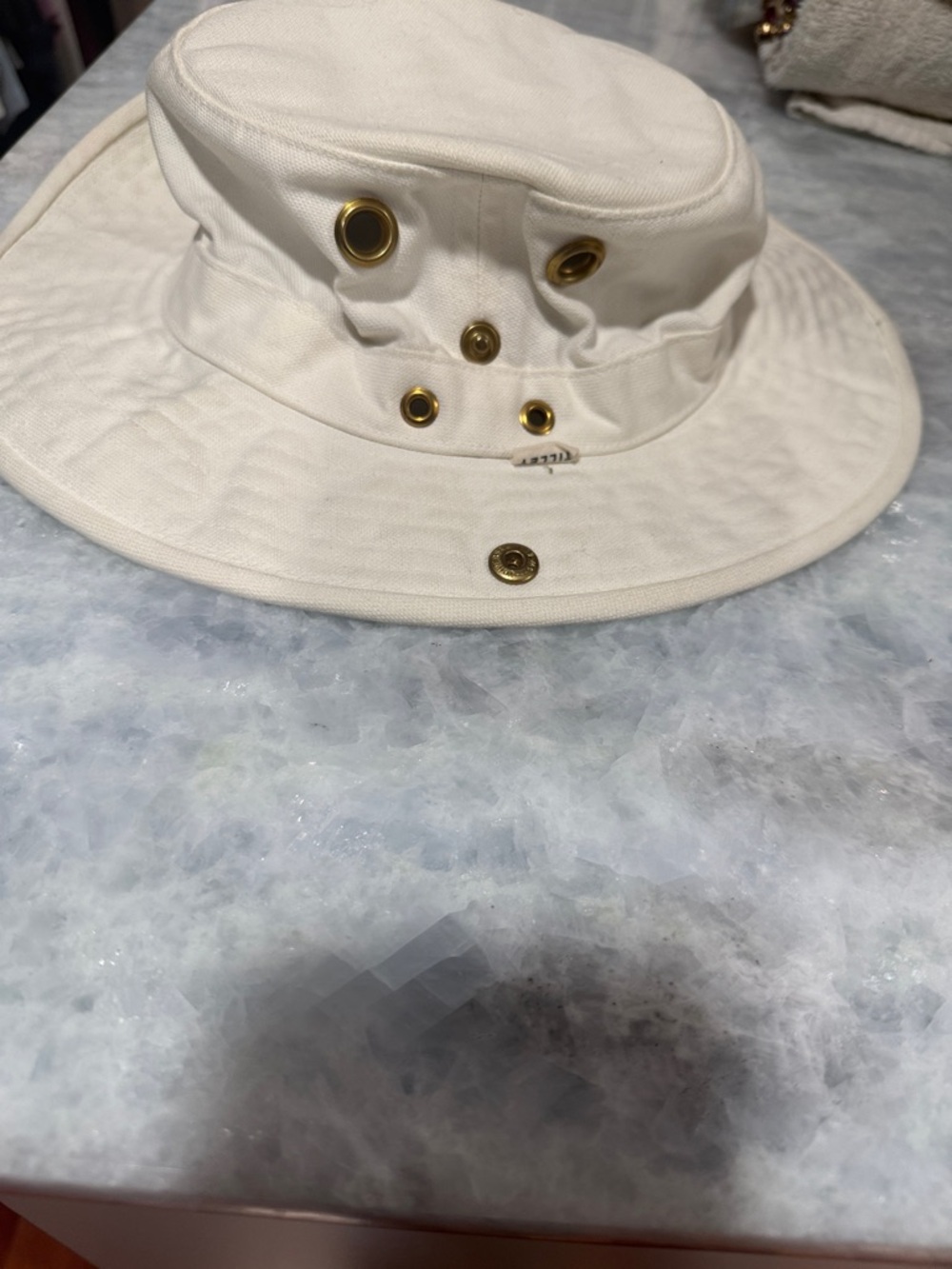 Tilley women Cream Cotton Bucket Hat with Gold Eyelets